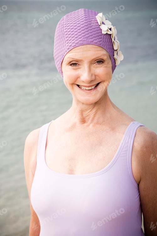 Preview: Senior Woman In A Swimsuit And Swimming Hat, At The Beach