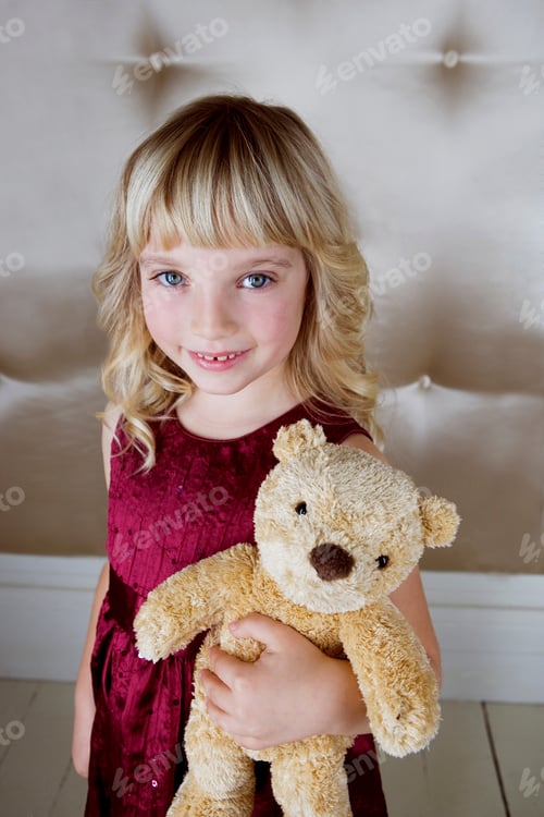 Preview: Young Girl In Party Dress, Holding A Teddy Bear