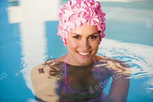 Preview: A Woman In A Swimming Hat In A Pool