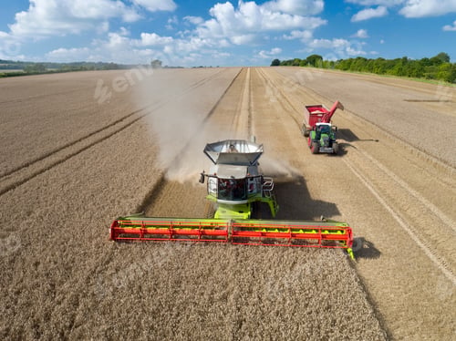 Preview: Aerial View Of Combine Harvester Harvesting Wheat In Field