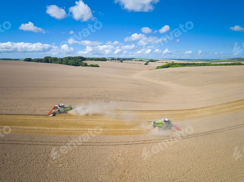 Preview: Aerial View Of Two Combine Harvesters Harvesting Wheat Crop
