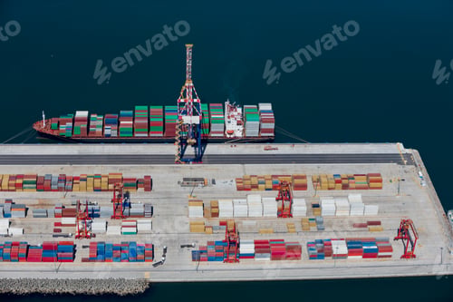 Preview: Aerial View Of Dockyard With A Container Ship Moored Beside A Single Gantry Crane