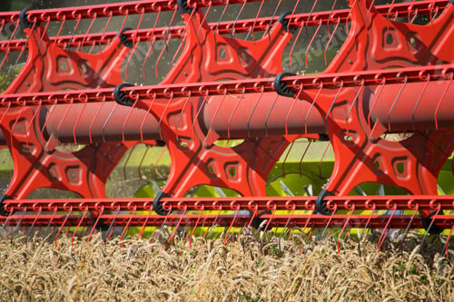 Preview: Close Up Of Combine Harvester Blades Harvesting Wheat Crop