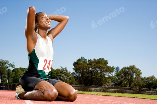 Preview: Portrait Of A Female Athlete Celebrating Her Win