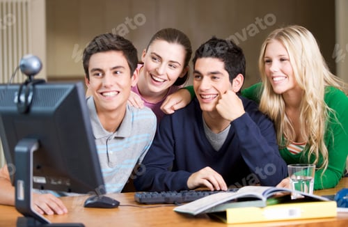 Preview: Four Teenage Friends Using A Computer