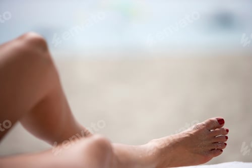 Preview: Close Up Shot Of Female Feet With Sand Particles On Them.