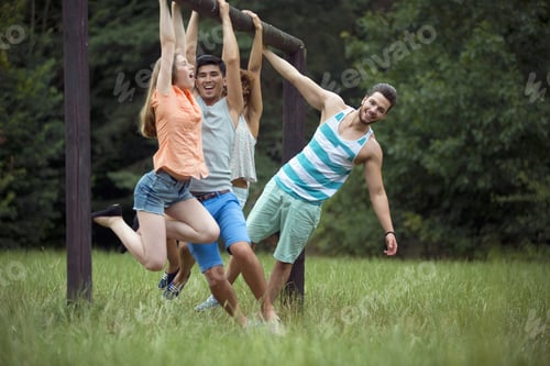 Preview: Couples Hanging On Beam In Park Playground Together