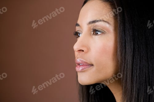 Preview: Portrait Of A Young Black Woman With Long Straight Hair