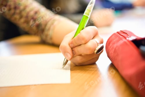 Preview: Close-Up Of Hand Writing With Pen