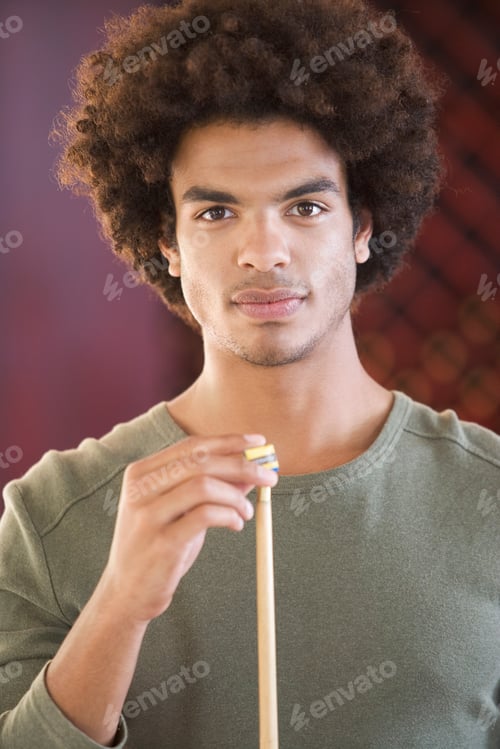 Preview: A Young Man Playing Pool