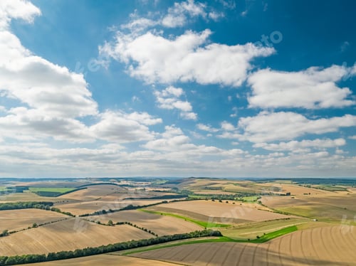 Preview: Aerial Landscape Of Summer Wheat And Barley Field Crops For Harvest And Blue Sky With Fluffy White