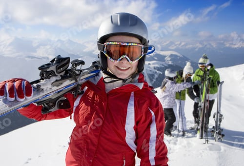 Preview: Family In Goggles On Winter Ski Vacation In Mountains Smiling At Camera