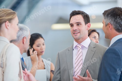 Preview: Happy Business Employees Involved In Conversation