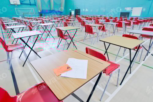 Preview: Side Shot Of Desks Arranged In A Wide Exam Hall
