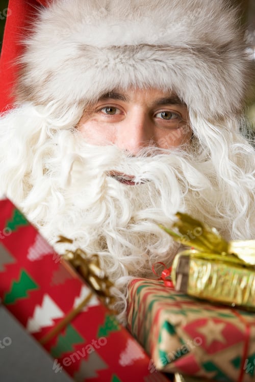 Preview: Father Christmas/Santa Claus Holding A Pile Of Presents