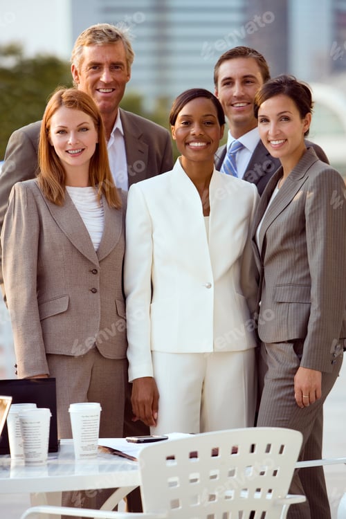 Preview: Portrait Of Businesspeople Having Informal Meeting At Pavement Cafe