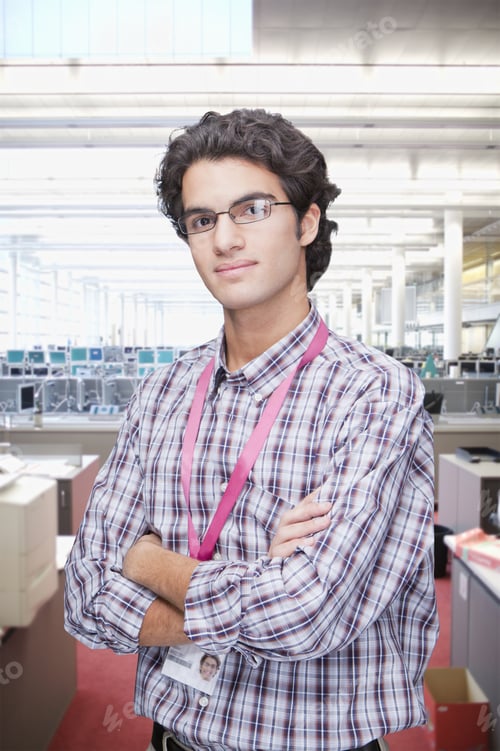 Preview: Portrait Of Businessman Standing In Modern Office