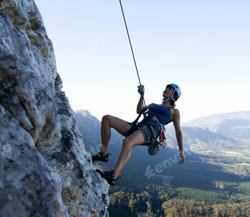 Preview: A Climber Abseiling Ona A Cliff