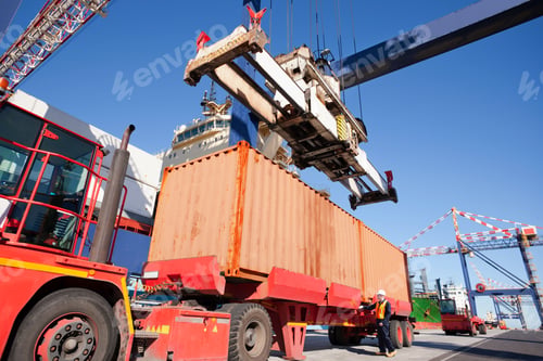 Preview: Lorry Loaded With A Cargo Container Using A Gantry Crane At A Dockyard