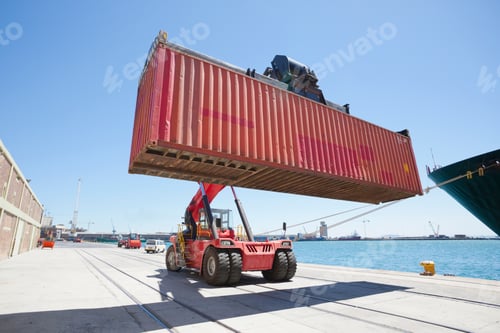 Preview: Close Up Of A Mobile Crane Moving Cargo Container At A Dockyard