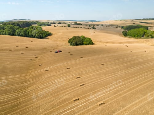 Preview: Aerial Landscape Of Harvested Summer Farm Wheat And Barley Fields And Straw Bales