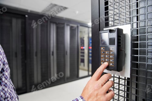 Preview: Close Up Of A Technician Using Fingerprint Scanner At The Data Centre