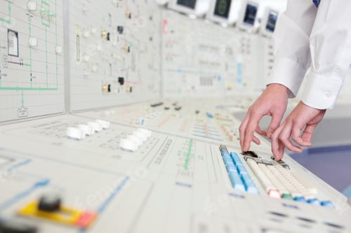 Preview: Close-Up Shot Of The Arms Of An Engineer Pushing A Button On The Control Panel.
