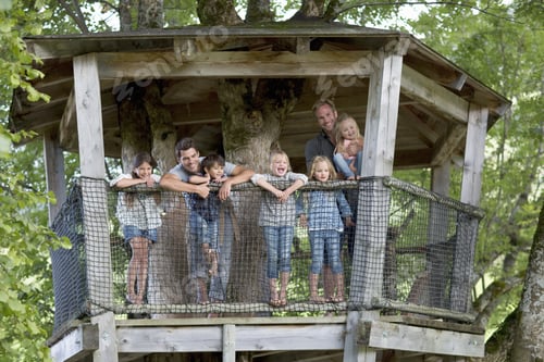 Preview: Father With Children In Adventure Playground Tree House