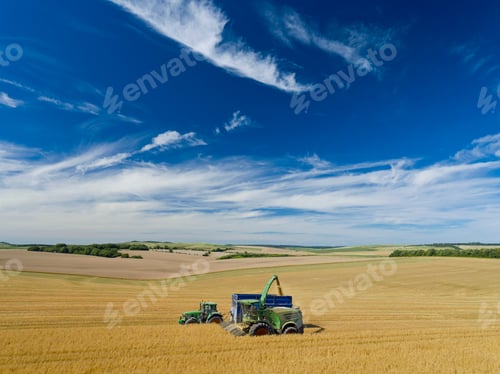 Preview: Aerial Shot Of Forage Harvesting Oats And Filling Trailer