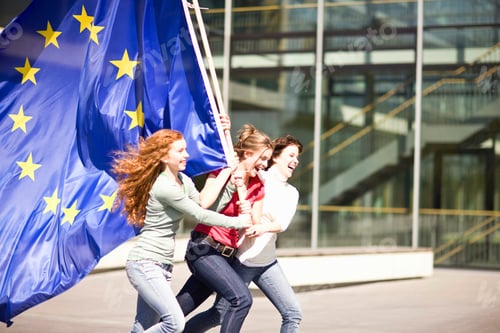 Preview: Young Girls Laughing And Walking Holding An Eu Flag