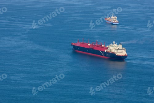 Preview: Aerial View Of A Natural Gas Cargo Ship And A Cargo Container Ship At The Sea