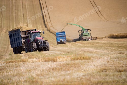 Preview: Tractor And Trailer In Field Harvesting Oats