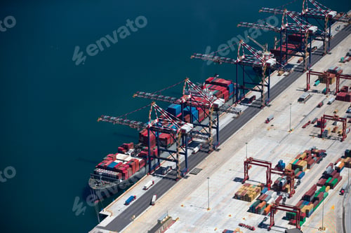 Preview: Aerial View Of A Container Ship Anchored At A Commercial Dock.
