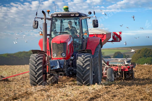 Preview: Tractor Pulling Drill Sowing Wheat Seed In Field