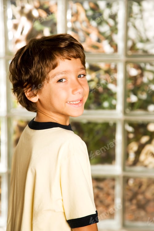 Preview: Rear View Latino Boy Head Turned Towards Camera
