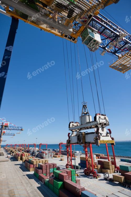 Preview: Rows Of Cargo Containers Stacked At A Dockyard Using Gantry Cranes