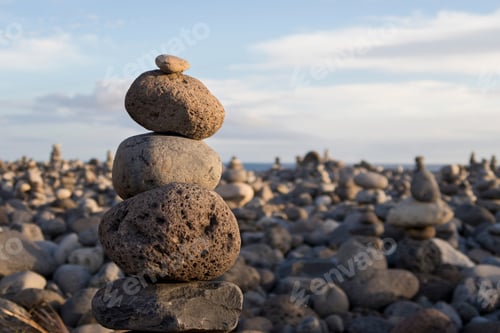 Preview: Stones In Stack Balanced On Top Of Each Other On Beach