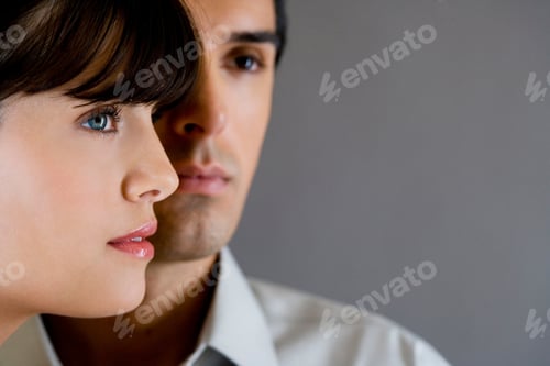 Preview: Portrait Of A Young Couple Staring Off Into The Distance