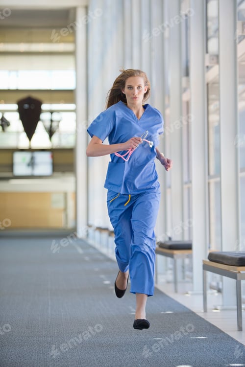 Preview: Nurse Running Down The Hospital Corridor