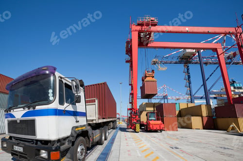 Preview: Cargo Containers Being Loaded On Lorries Using Gantry Cranes