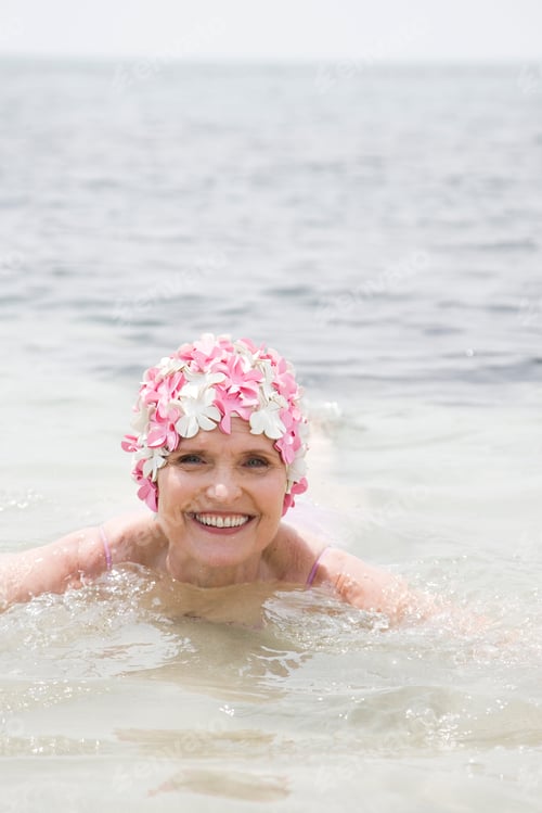 Preview: Senior Woman In A Swimming Hat, Swimming In The Ocean