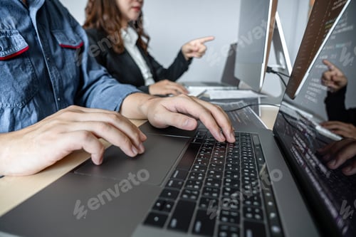 Preview: Two Professional Programmer Cooperating And Working On Web Site Project In A Software Developing On