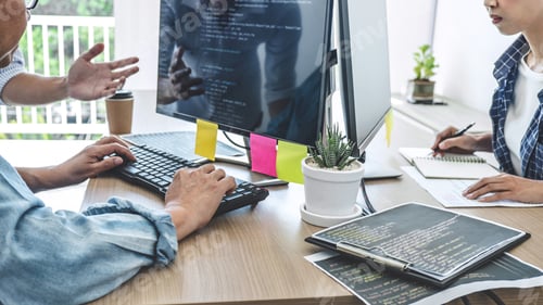 Preview: Teamwork Of Professional Programmers Cooperating At Developing Programming And Website Working In A