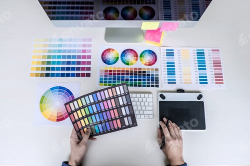 Preview: Male Creative Graphic Designer Working On Color Selection And Color Swatches, Drawing On Graphics
