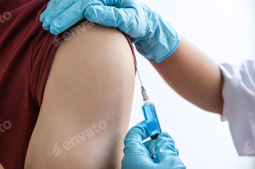 Preview: Doctor Making Injection Vaccination Patient To Prevent Pandemic Of The Disease, Flu Or Influenza