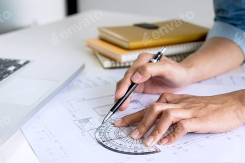 Preview: Architect Working On Blueprint, Engineer Working With Engineering Tools For Architectural Project