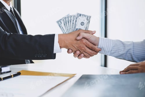 Preview: Bribery And Corruption Concept, Bribe In The Form Of Dollar Bills, Businessman Shaking Hands And