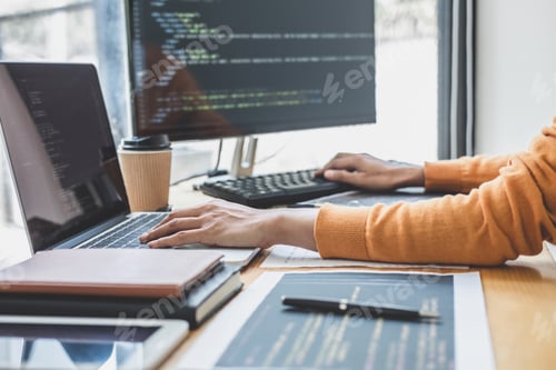 Preview: Young Professional Programmer Working At Developing Programming And Website Working In A Software