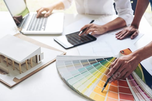 Preview: Two Interior Design Or Graphic Designer At Work On Project Of Architecture Drawing With Work Tools