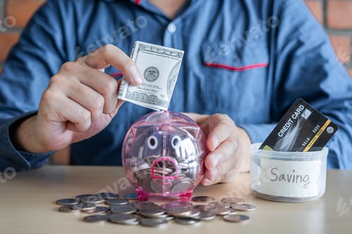 Preview: Man Putting Coins Into Piggy Bank With Savings And Analysis Business Investment Strategy With